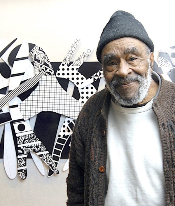 renowned-detroit-artist-charles-mcgee-92-designs-11-story-mural-michigan-radio